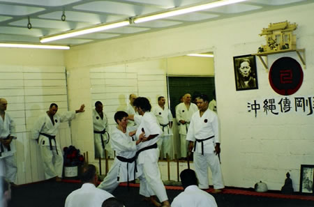 Sensei Linda Marchant training under the guidance Higaonna Shihan at Sensei George's Institute of Traditional Karate-do in 2003 